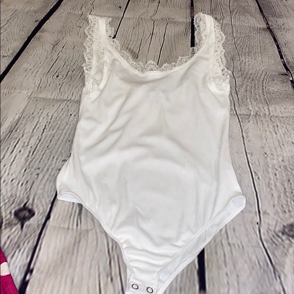 Cute body suit!  Never worn.  No tags.